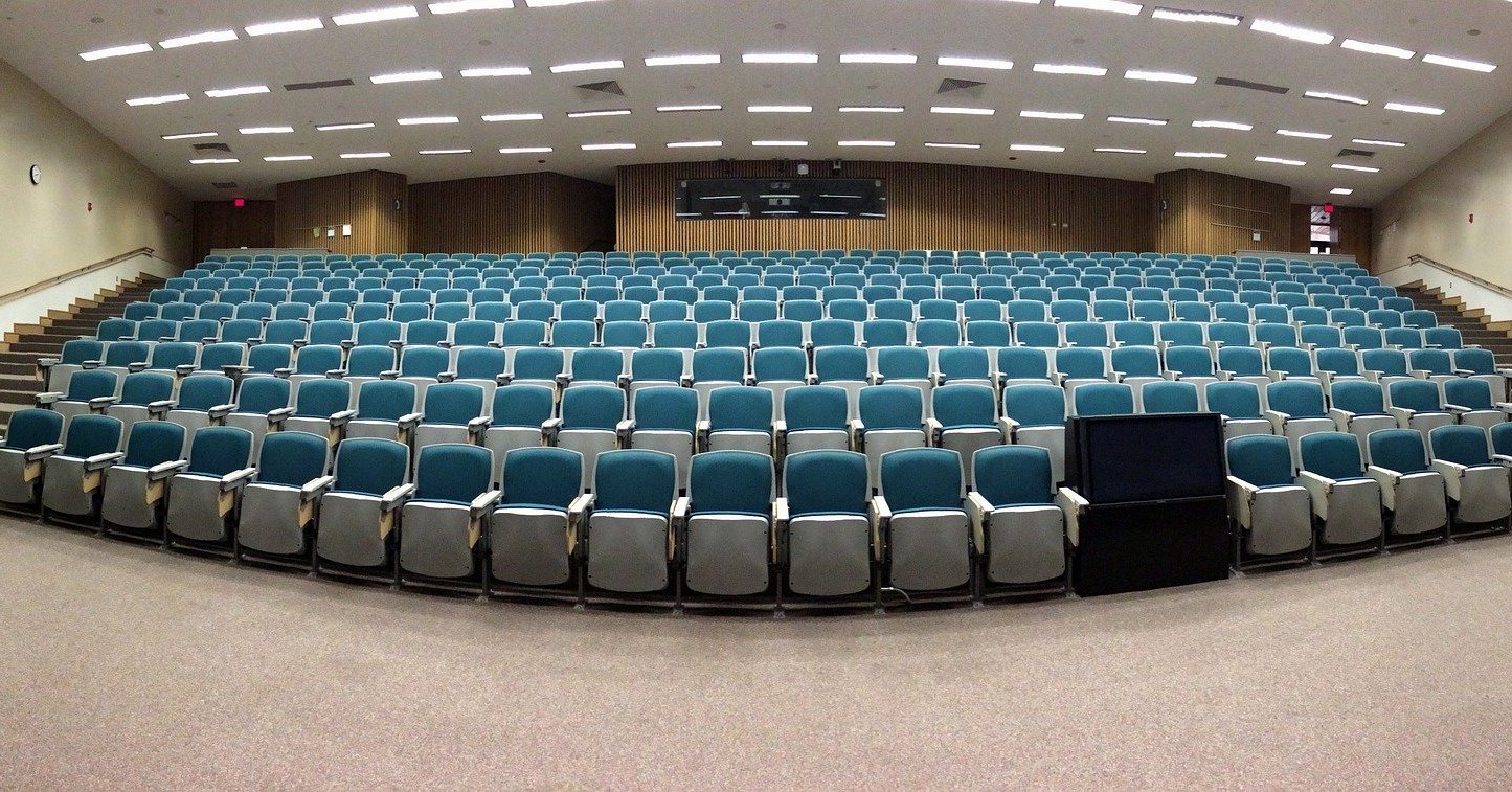 Picture shows an empty lecture hall as a symbol of the emptiness of the homeopathic teaching building.